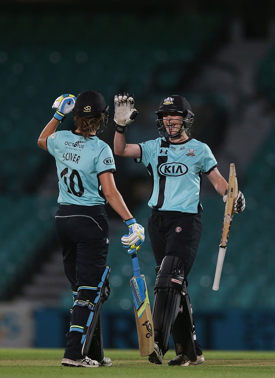 Natalie Sciver and Beth Morgan celebrate victory