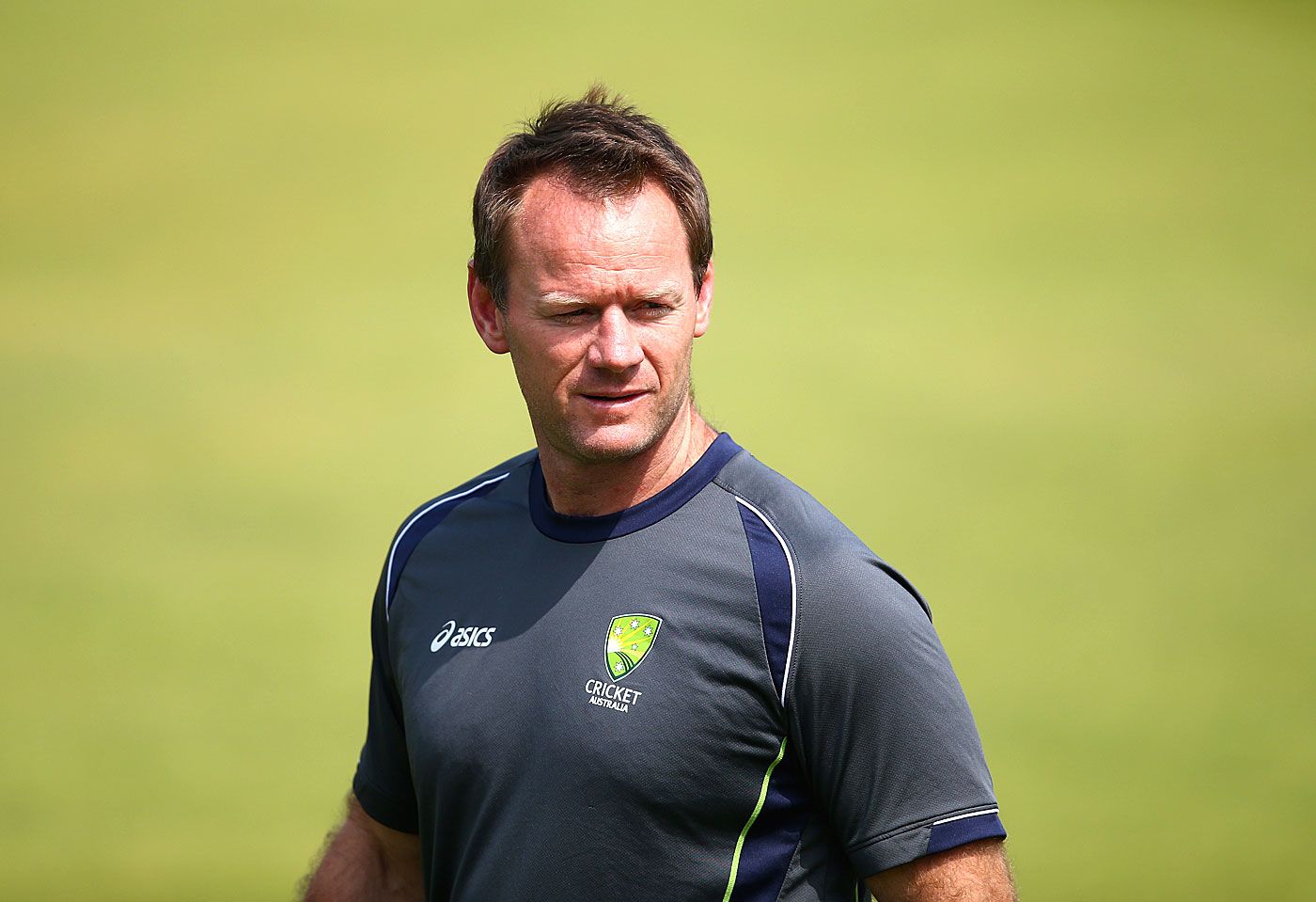 Pat Howard looks on during training