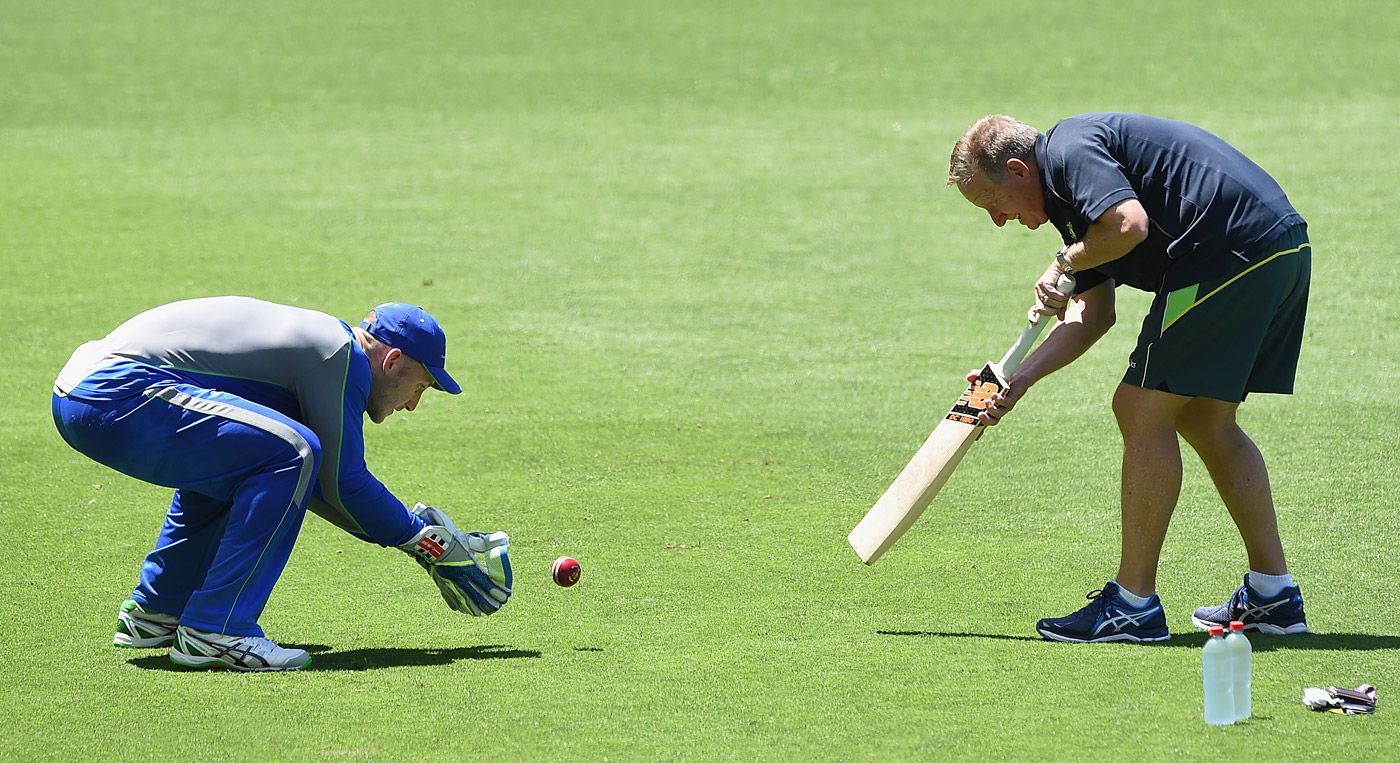 Peter Nevill trains with Ian Healy at the Gabba