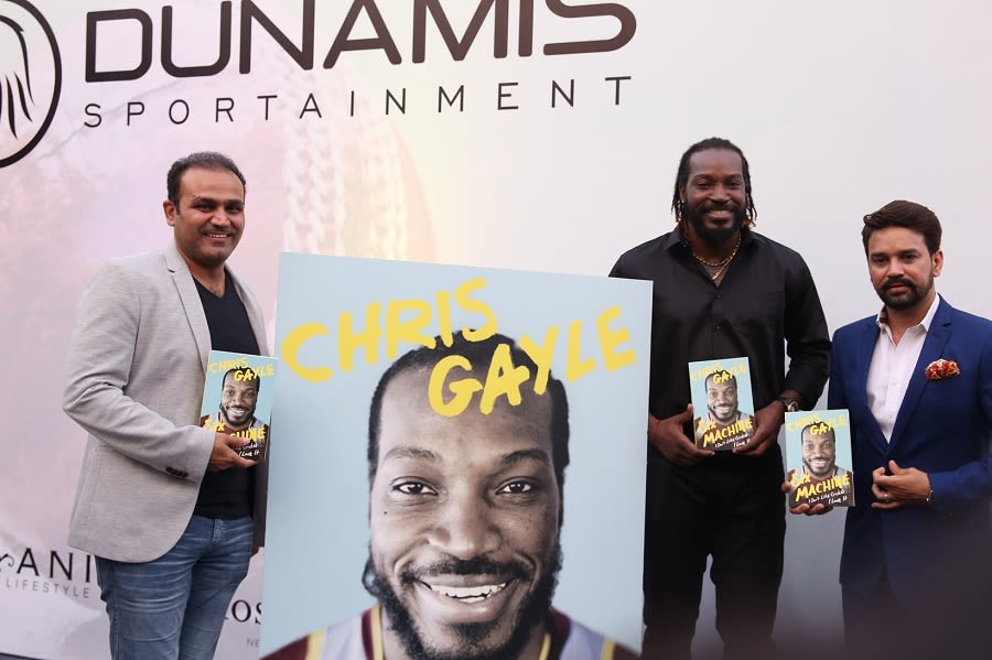 Virender Sehwag, Chris Gayle and Anurag Thakur at the launch of Gayle's autobiography <i>Six Machine</i>