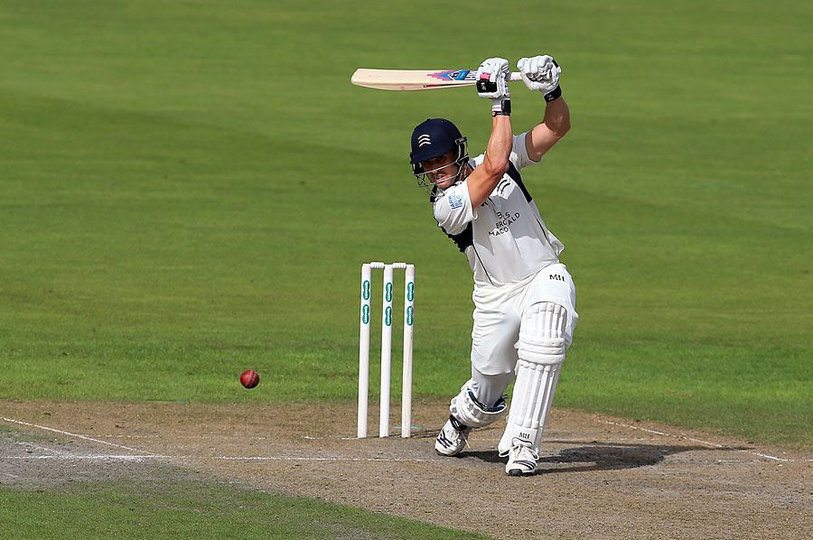 Nick Compton drives through the covers