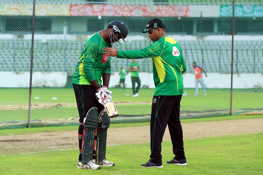 Bangladesh batting consultant Thilan Samaraweera helps Alauddin Babu with his stance