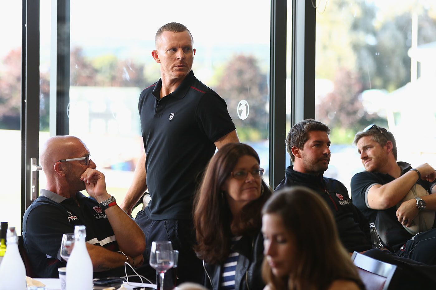 Somerset captain Chris Rogers watches the action from Lord's unfold on TV