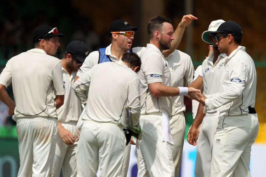 Mark Craig is congratulated after dismissing Virat Kohli