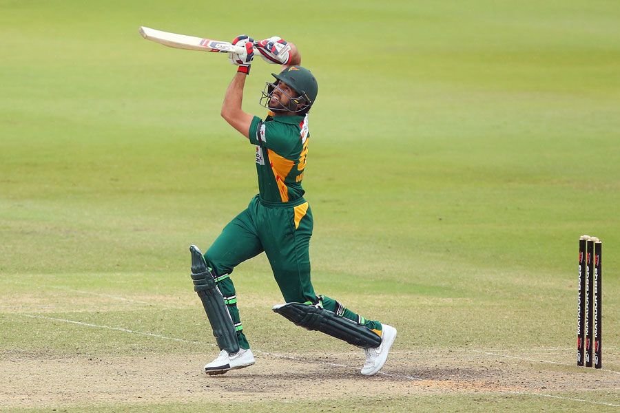 Dom Michael lofts down the ground on his way to 83