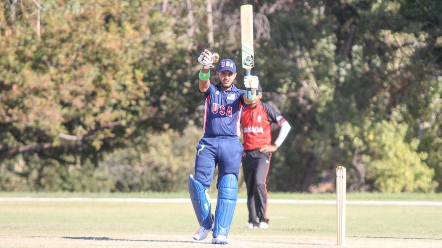 Fahad Babar raises his bat after his second fifty of the series