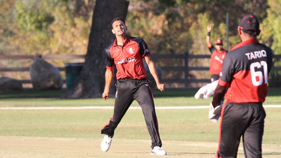 Cecil Pervez celebrates the wicket of Hammad Shahid