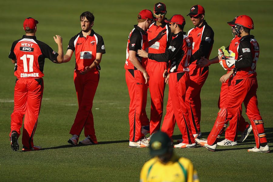 Cameron Valence is congratulated after taking a wicket