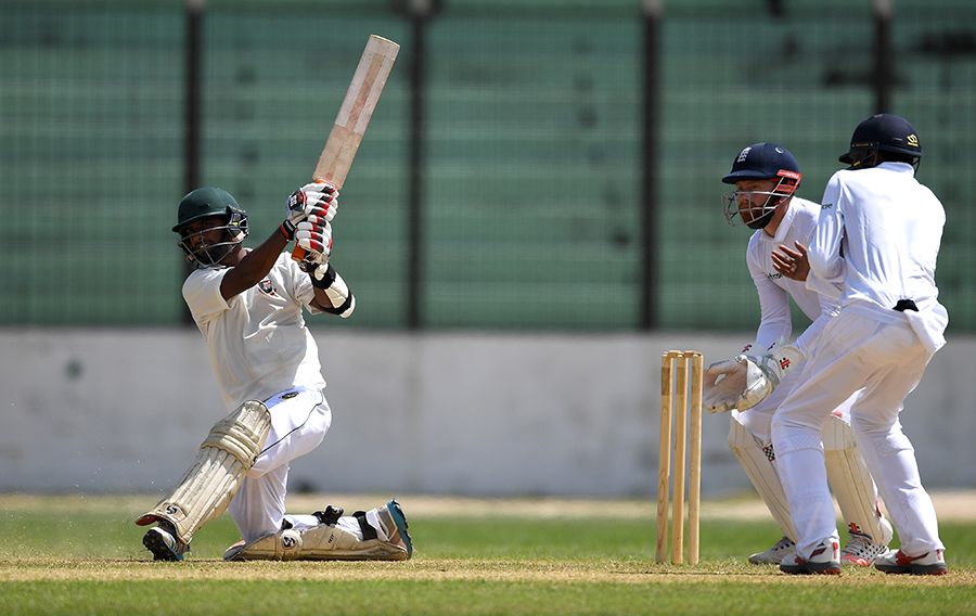 Abdul Mazid plays a sweep during his innings of 106