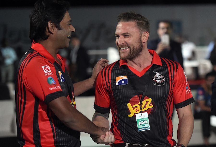Brendon McCullum shakes hands with Aaqib Javed