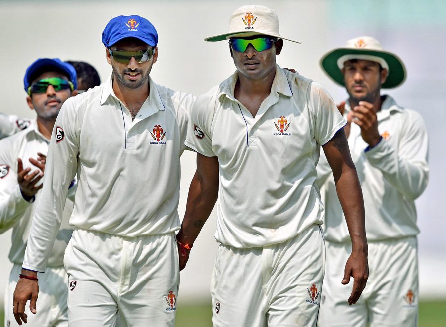 S Aravind and K. Gowtham lead Karnataka off the field