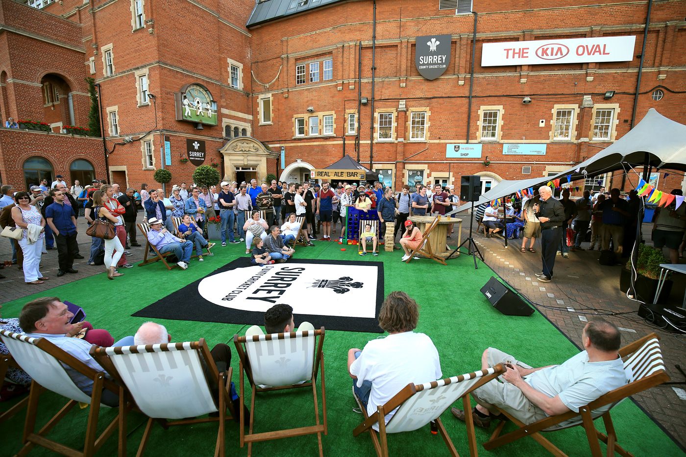 Pat Pocock sings for spectator's after the day's play at The Oval
