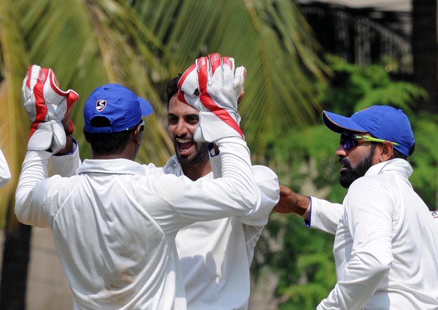S Aravind is jubilant after picking up a wicket