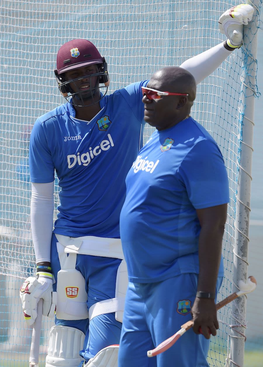Jason Holder and West Indies assistant coach Roddy Estwick at the nets
