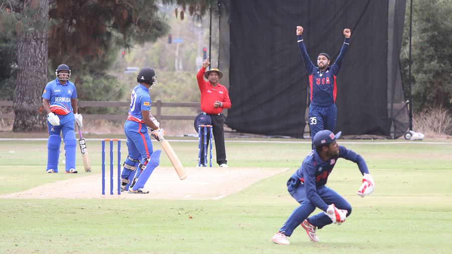 Jessy Singh and Akeem Dodson team up for the wicket of Tre Manders