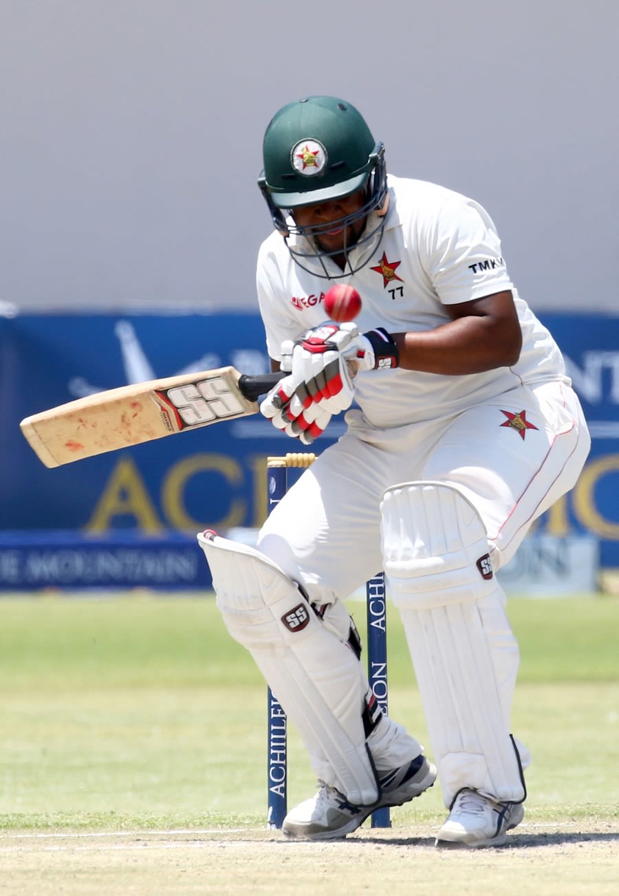 Tino Mawoyo tries to get under a bouncer