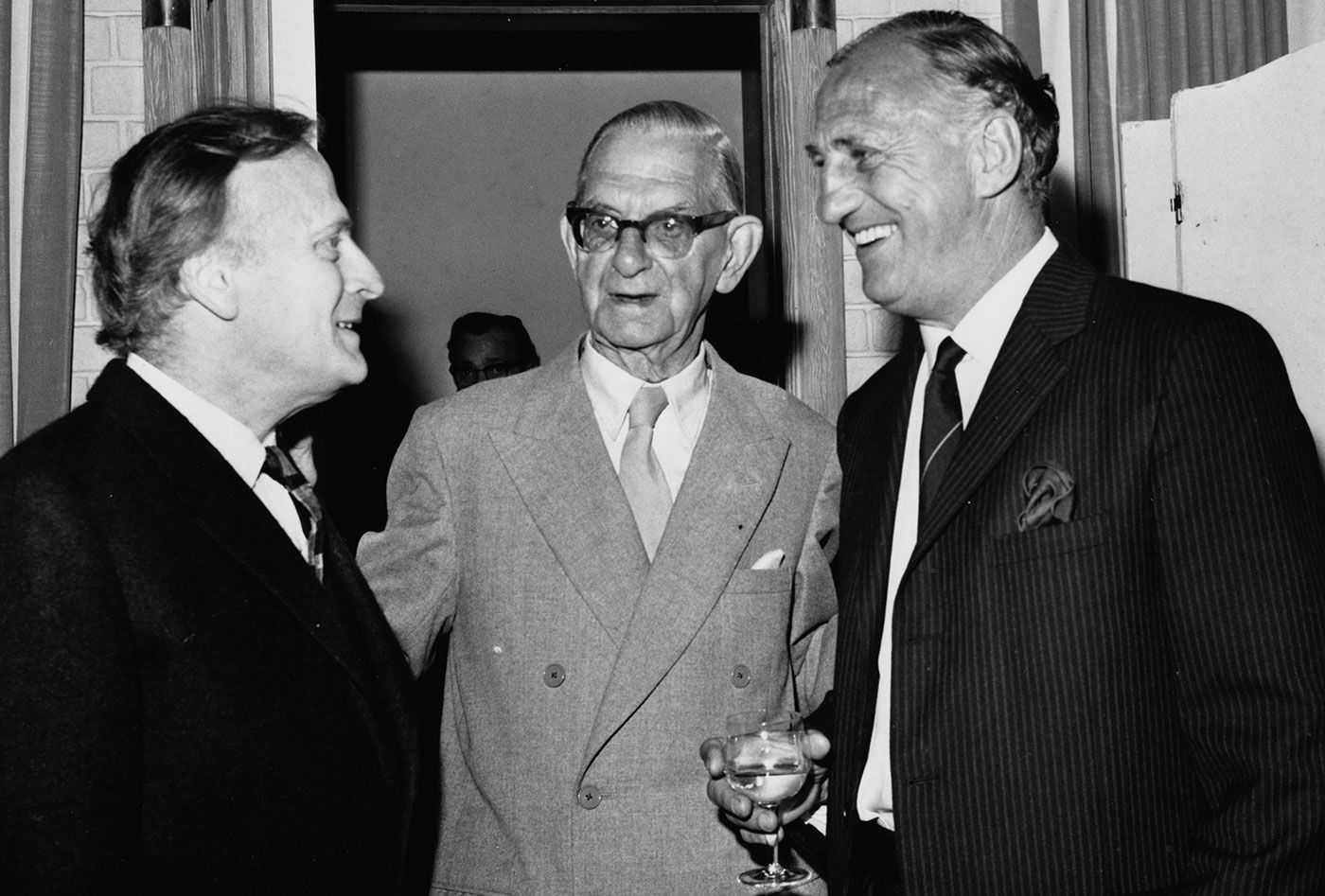(From left) Yehudi Menuhin, Neville Cardus and Len Hutton have a chat