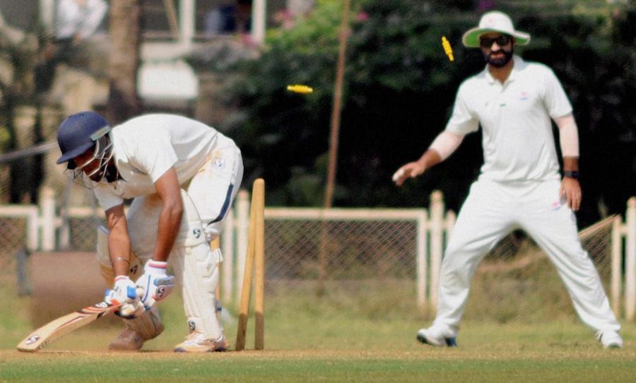 Smit Patel was bowled for 14
