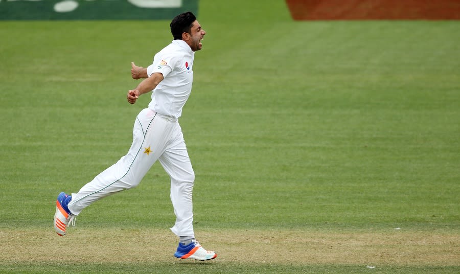 Imran Khan exults after taking a wicket