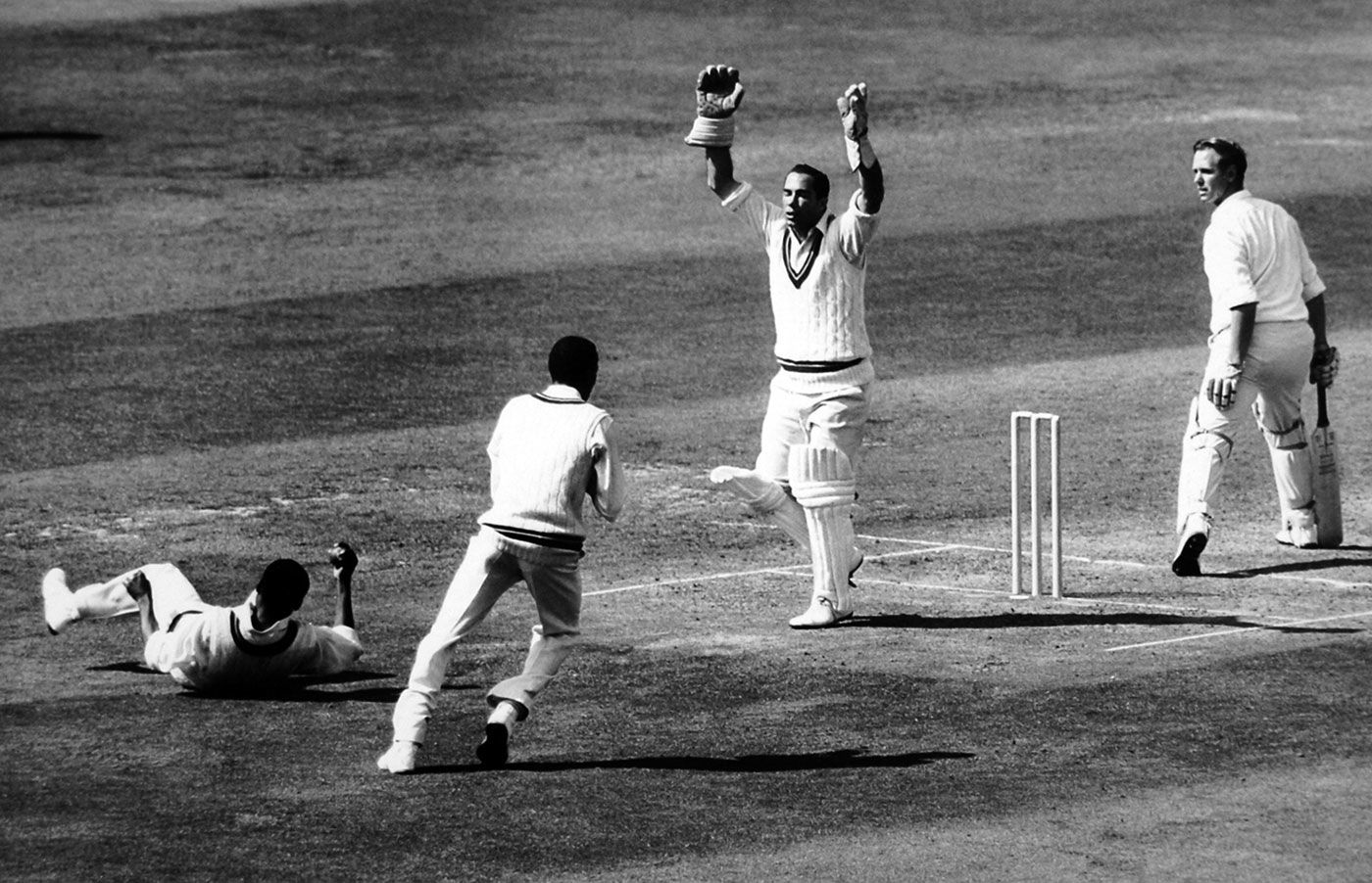 Ken Higgs is caught by Conrad Hunte off Garry Sobers