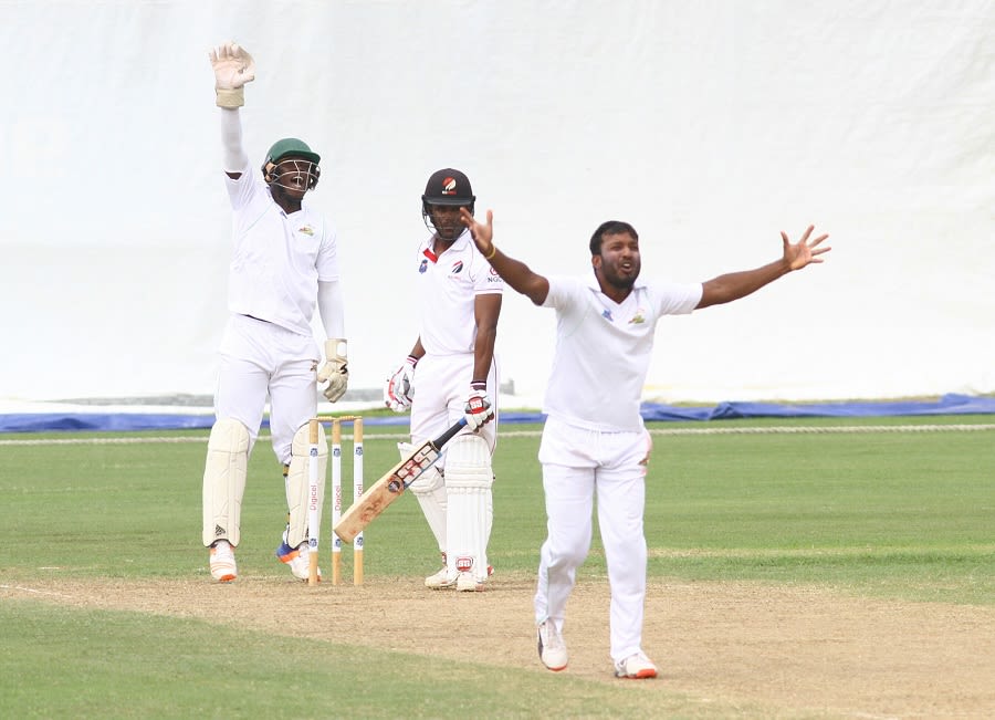 Veerasammy Permaul and Anthony Bramble appeal to the umpire