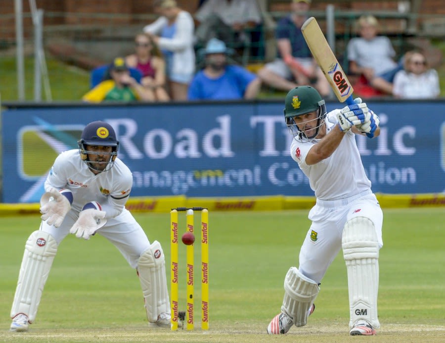 Stephen Cook hammers one through mid-off