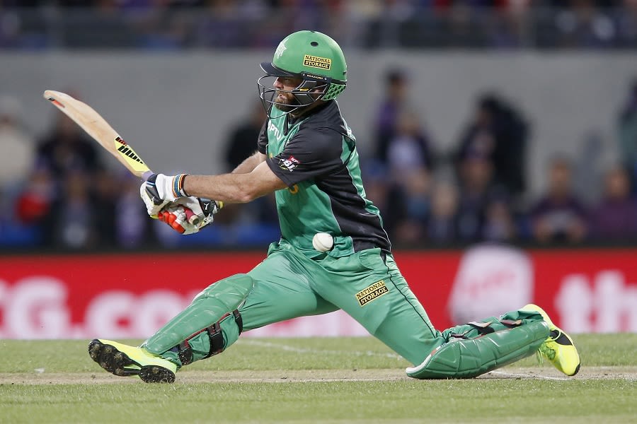 Rob Quiney slips as he plays a shot