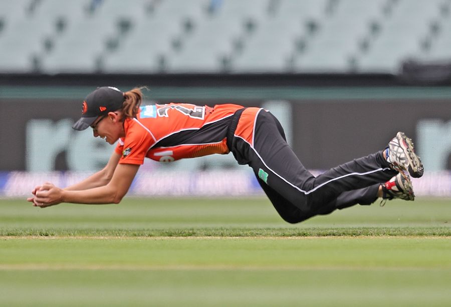 Lauren Ebsary completes a diving catch