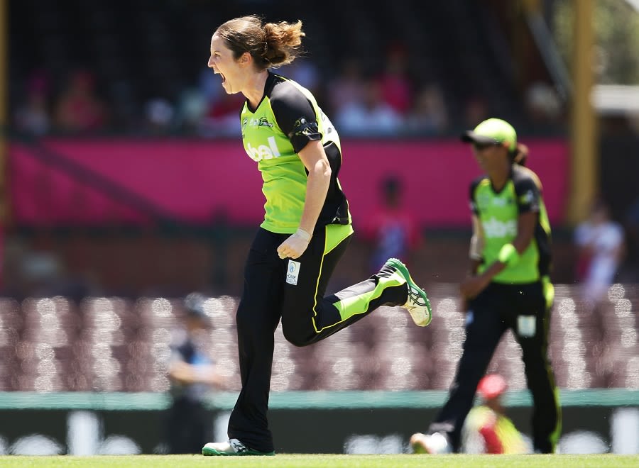 Rene Farrell exults after picking up one of her three wickets