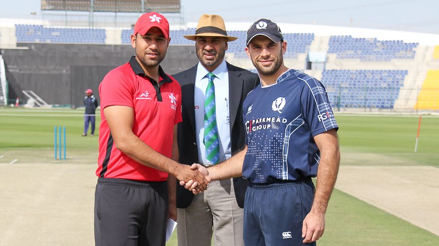 Hong Kong captain Babar Hayat and Scotland captain Kyle Coetzer at the coin toss for the opening match at the Desert T20