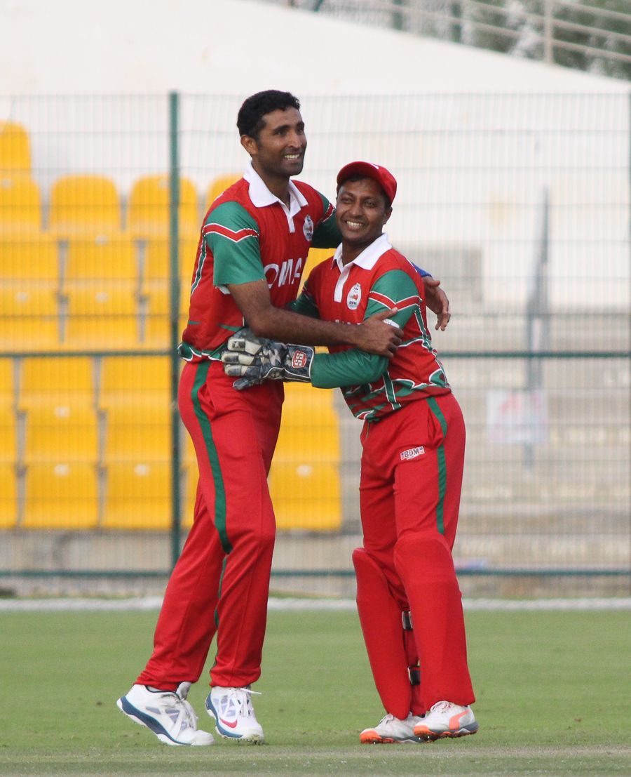 Kaleemullah celebrates the wicket of Michael Rippon with wicketkeeper-captain Sultan Ahmed