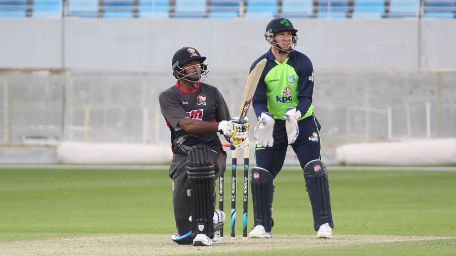 Amjad Javed slog sweeps Paul Stirling for the first of three sixes in the final over to end unbeaten on 47