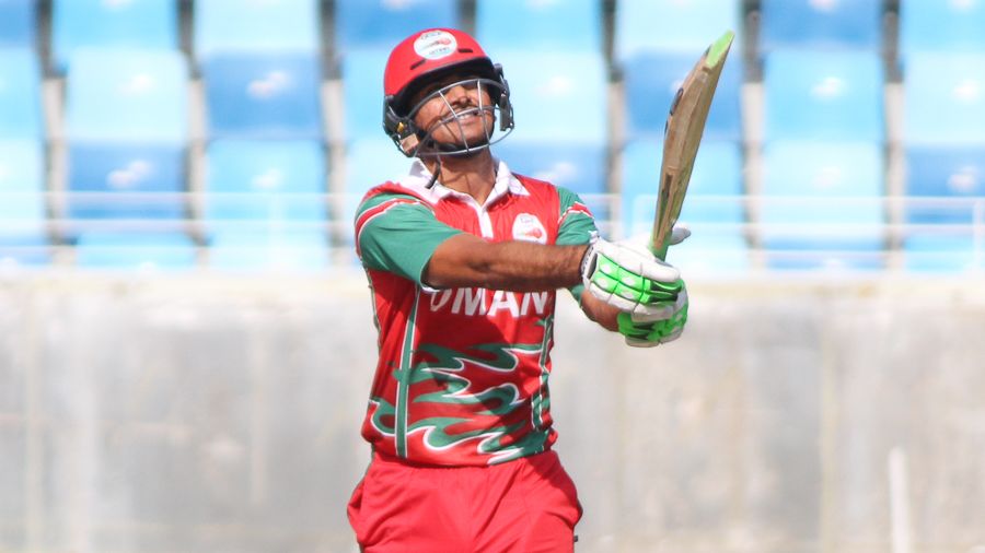 Naseem Khushi holds his pose after clocking Dawlat Zadran for six over midwicket