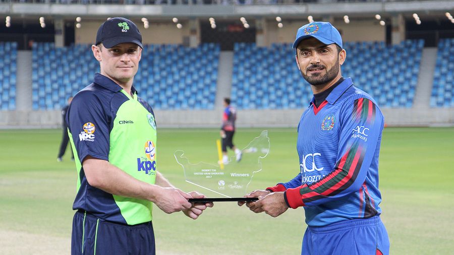 William Porterfield and Nawroz Mangal hold the tournament trophy ahead of the inaugural final