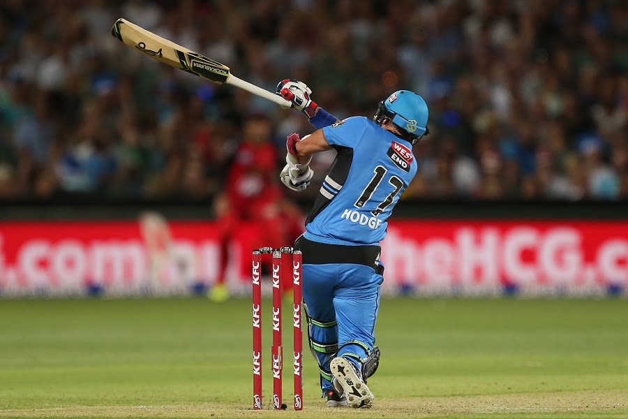 Brad Hodge loses his bat as he plays a shot