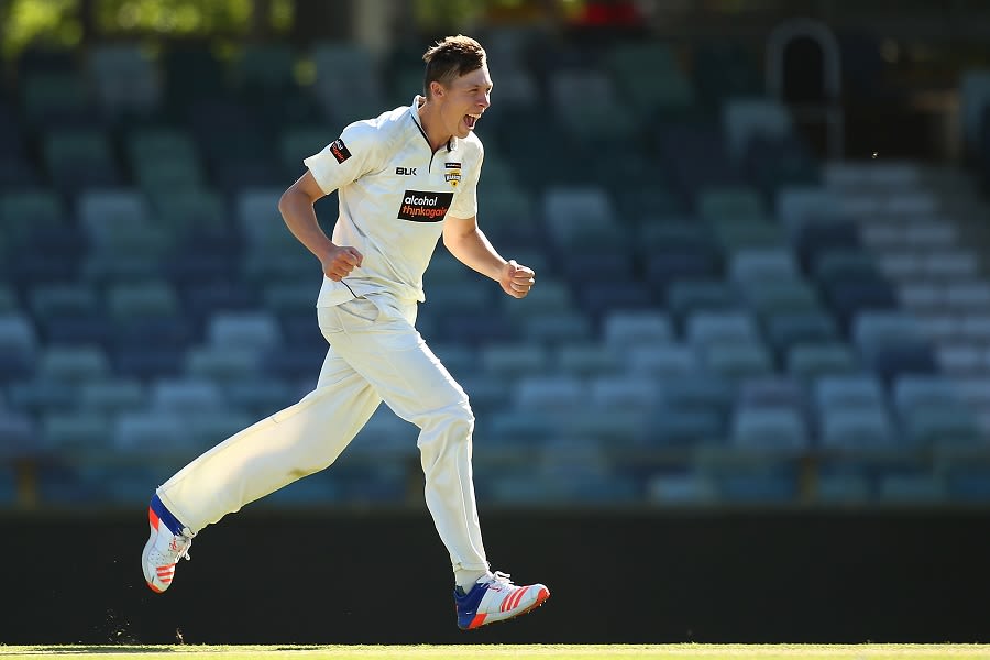 Simon Mackin celebrates a wicket