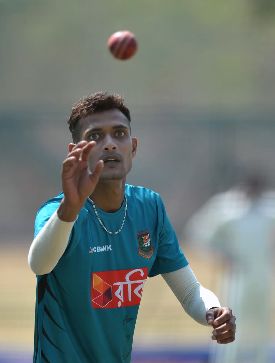 Shaiful Islam catches the ball during practice