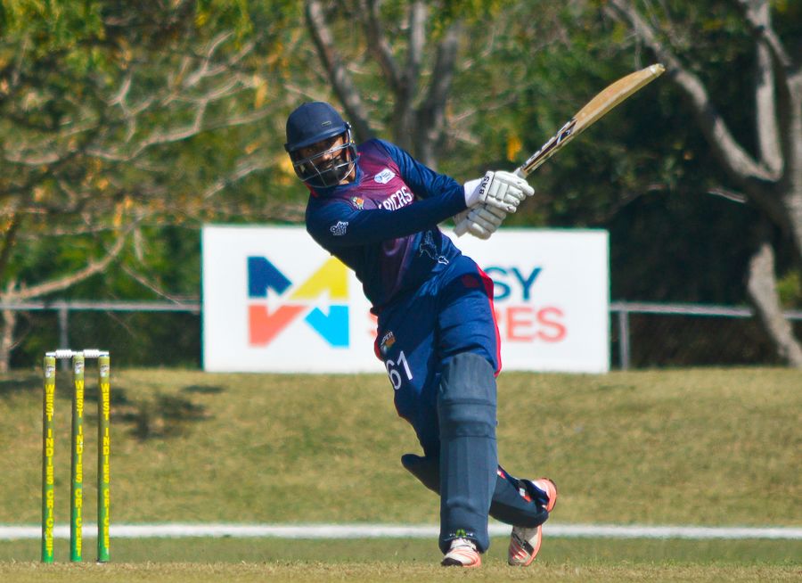 Hamza Tariq strokes a six during his 32