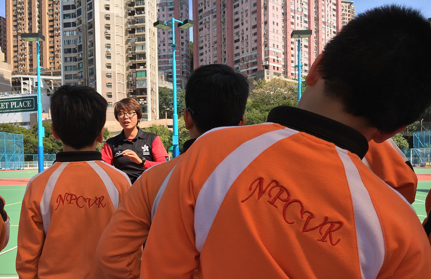 Emma Lai conducts a coaching session for children