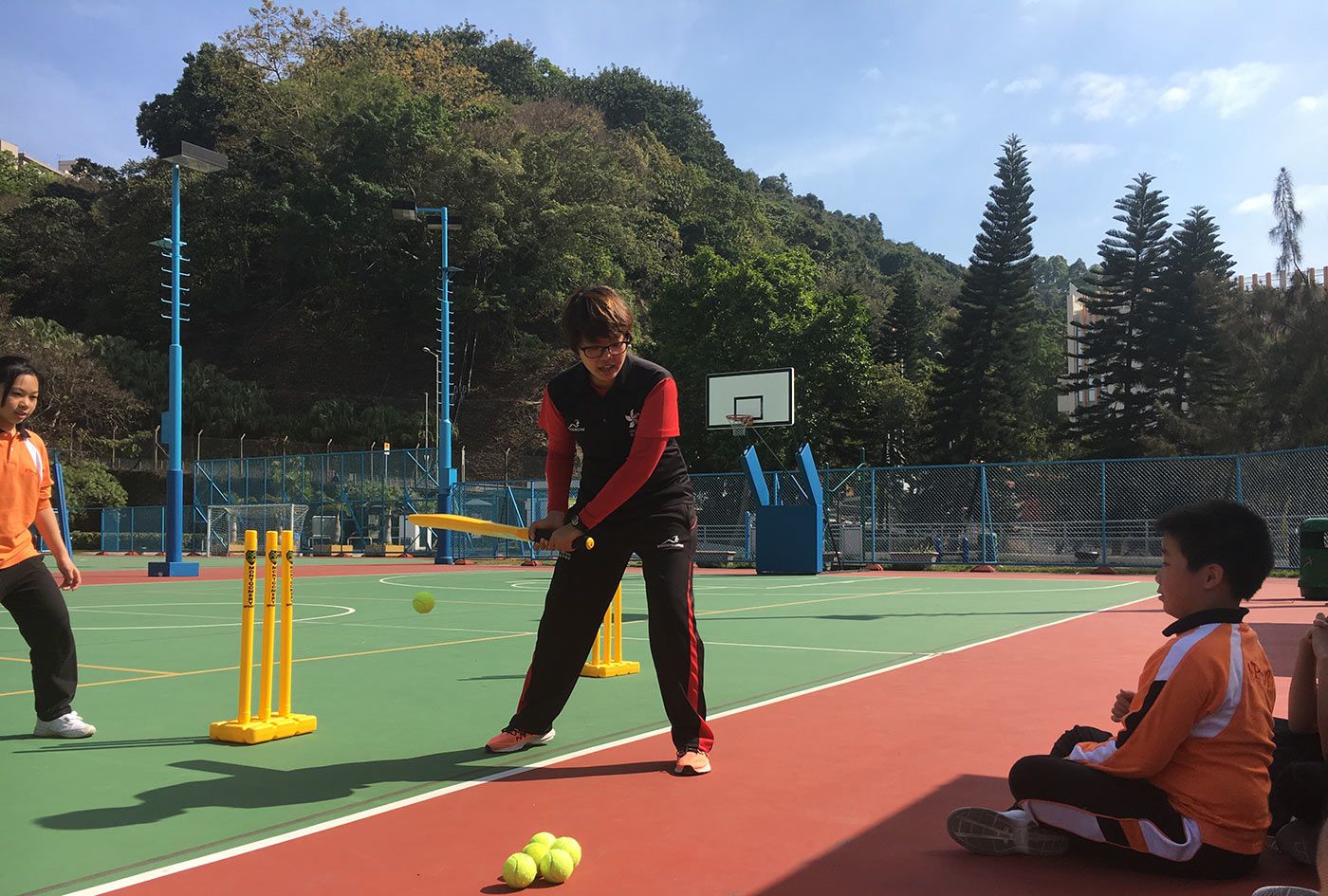 Emma Lai conducts a coaching session for children