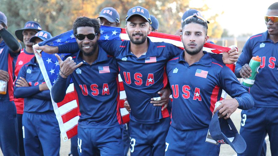 Akeem Dodson, Ali Khan and Fahad Babar celebrate during the medal ceremony