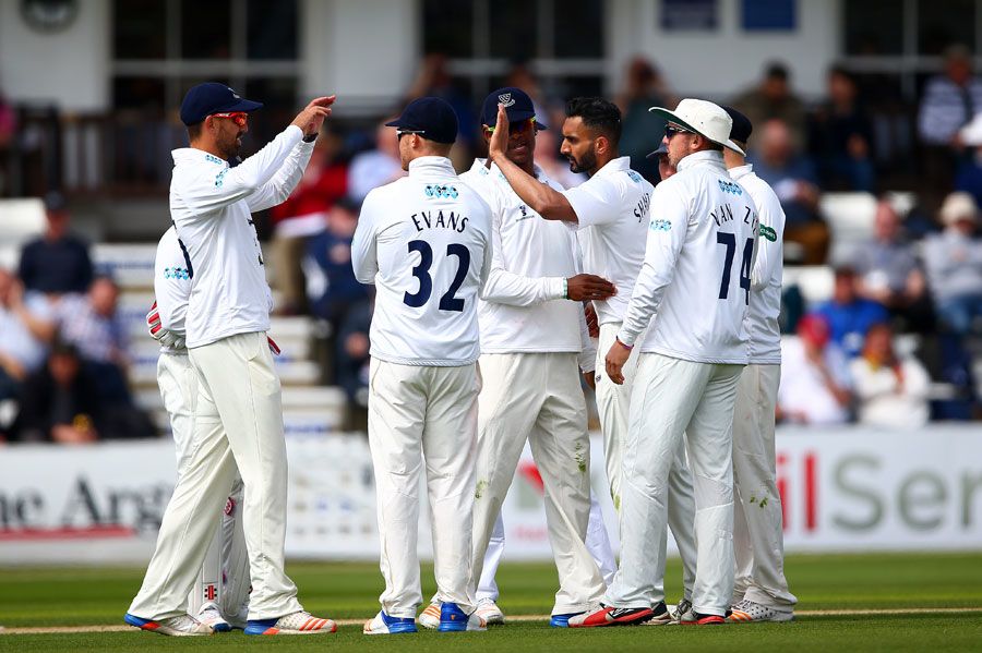 Ajmal Shahzad is congratulated on a wicket