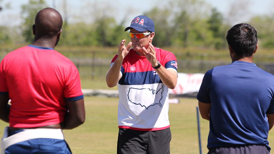 Trevor Penney goes through fielding instructions with the USA squad