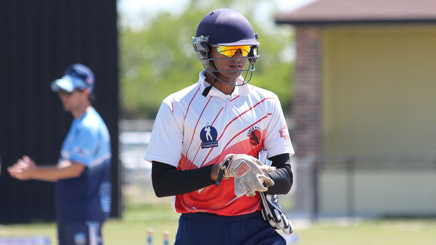 USA U-19 wicketkeeper Arjun Patel gets ready for a fielding drill