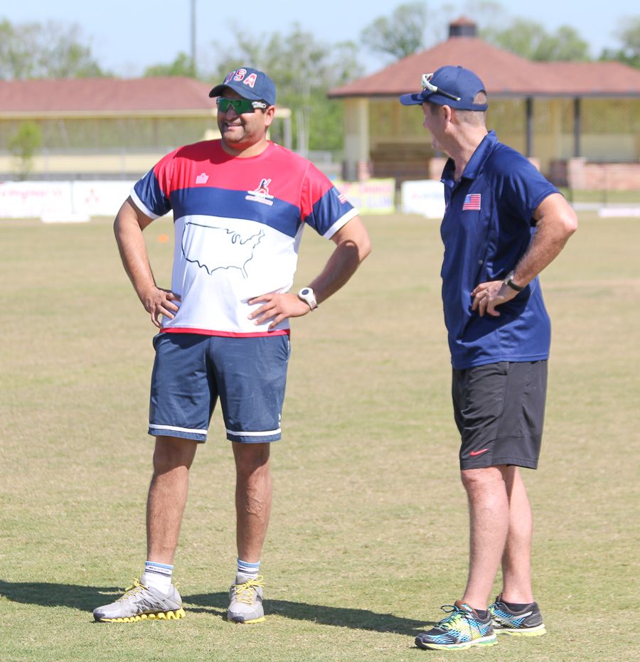 Former USA captain Sushil Nadkarni chats with fielding coach Trevor Penney