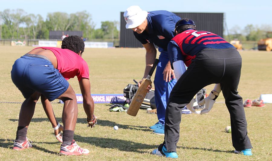 Wicketkeeping guru Peter Anderson puts USA keepers Akeem Dodson and Ibrahim Khaleel through a golf ball catching drill