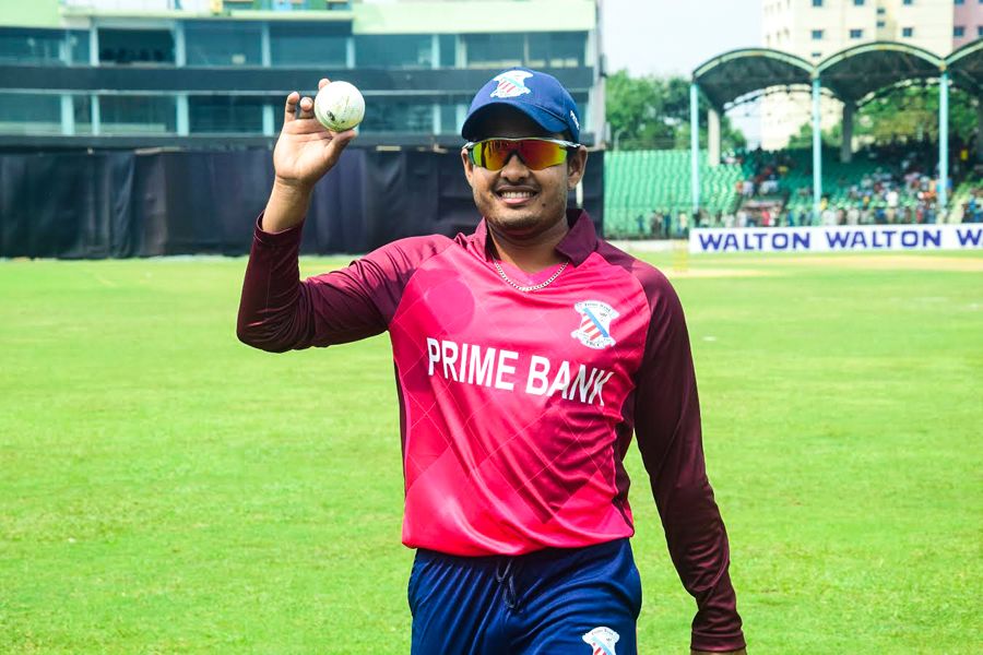 Al-Amin walks off the field after claiming a five-wicket haul