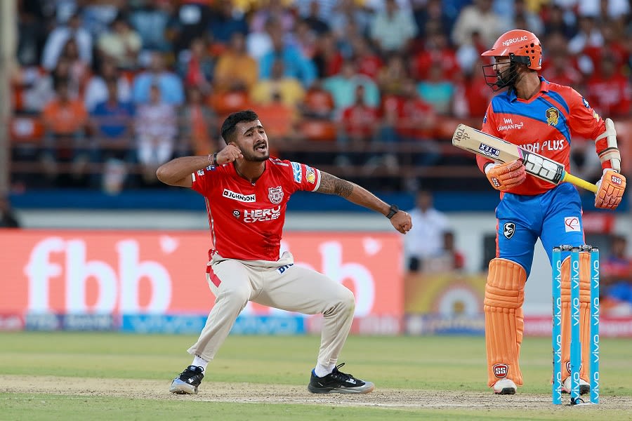 KC Cariappa celebrates after trapping Akshdeep Nath for zero
