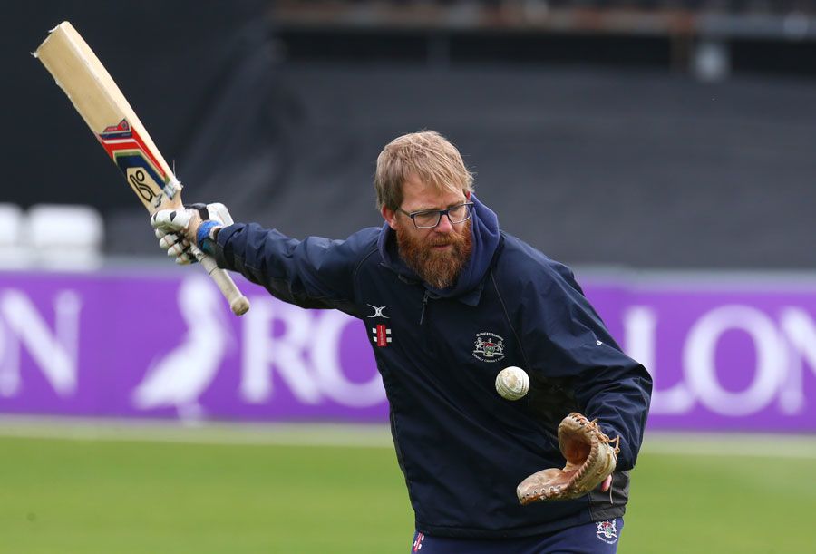 Gloucestershire coach Richard Dawson runs through a drill