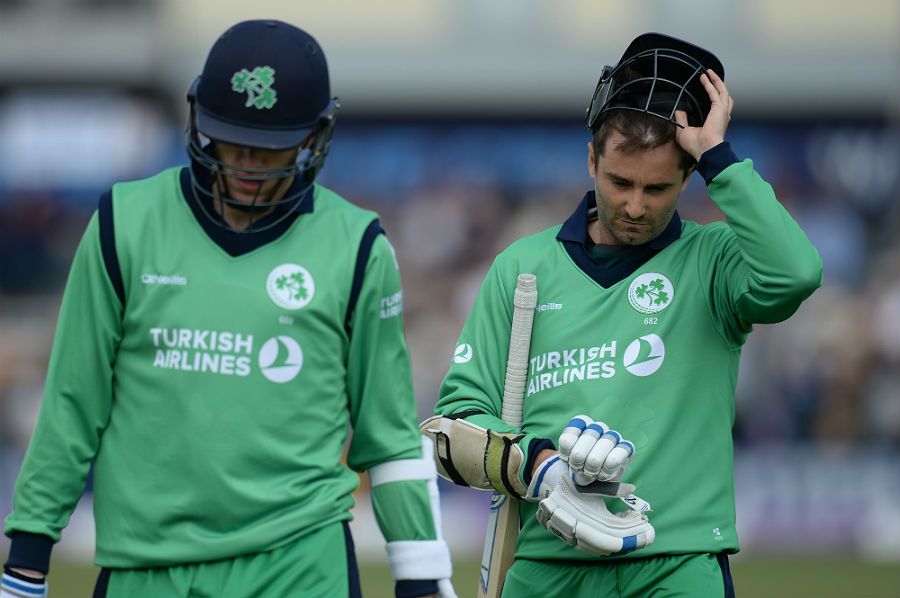 Ireland's Peter Chase and Tim Murtagh leave the field after a disappointing innings
